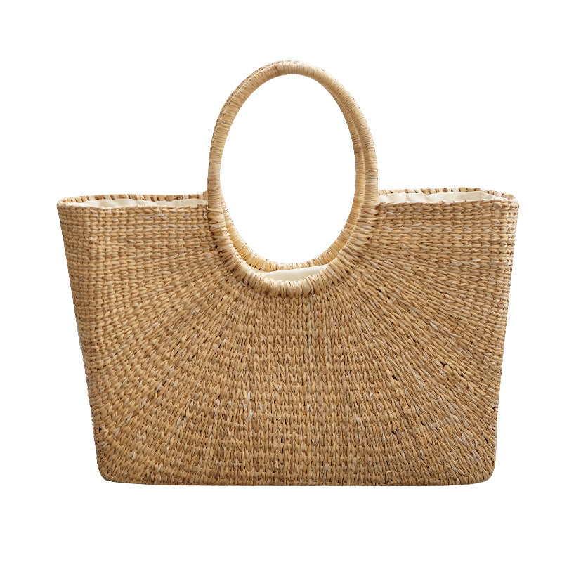 Quadratische modische Strohhandtasche