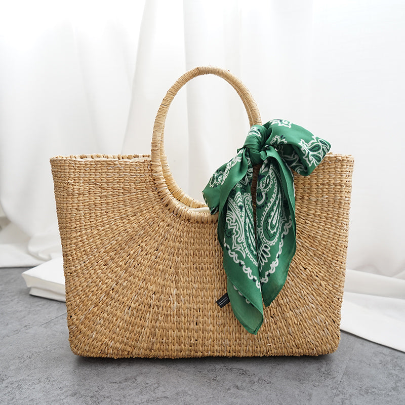 Quadratische modische Strohhandtasche