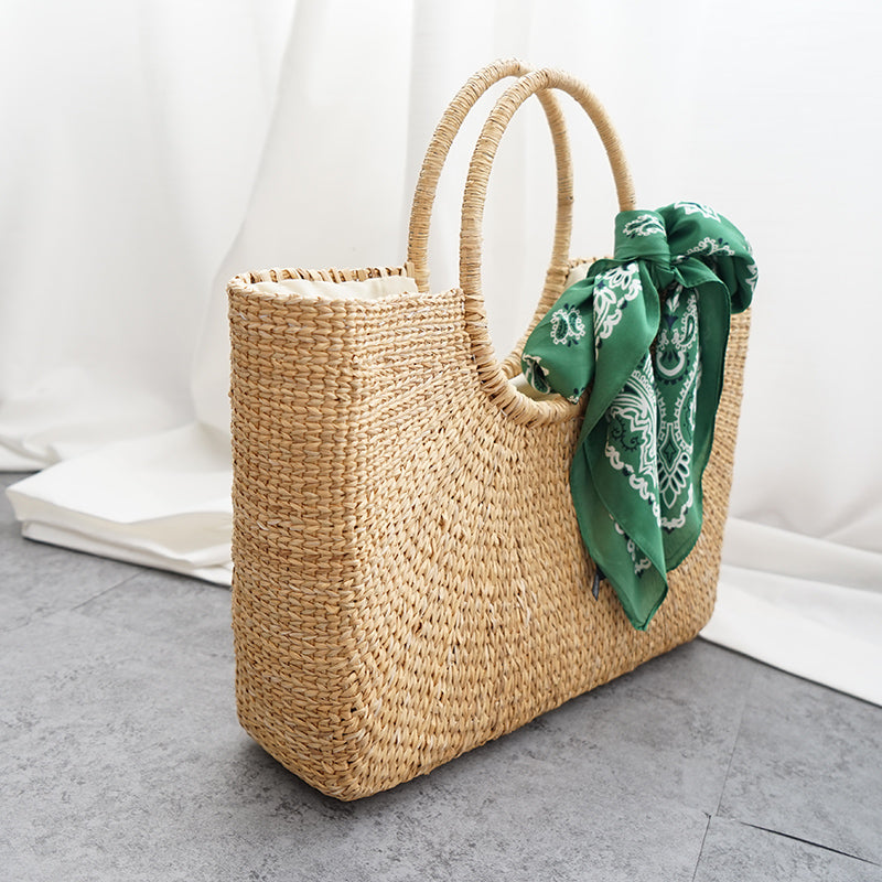 Quadratische modische Strohhandtasche