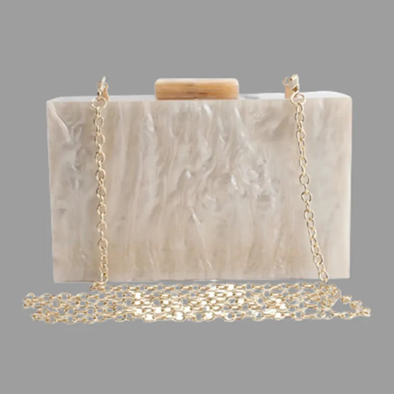 Pochette piccola in acrilico champagne