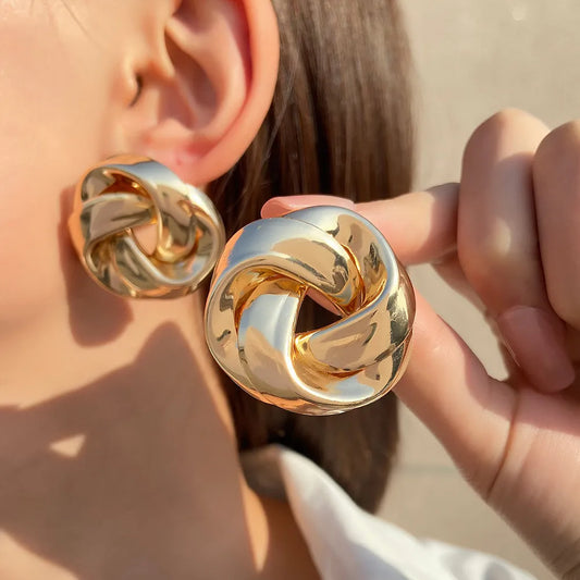 Orecchini a spirale irregolare con nodo per donna