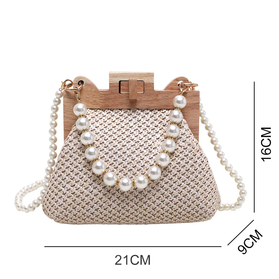 Borsa a tracolla in paglia intrecciata alla moda con clip in legno