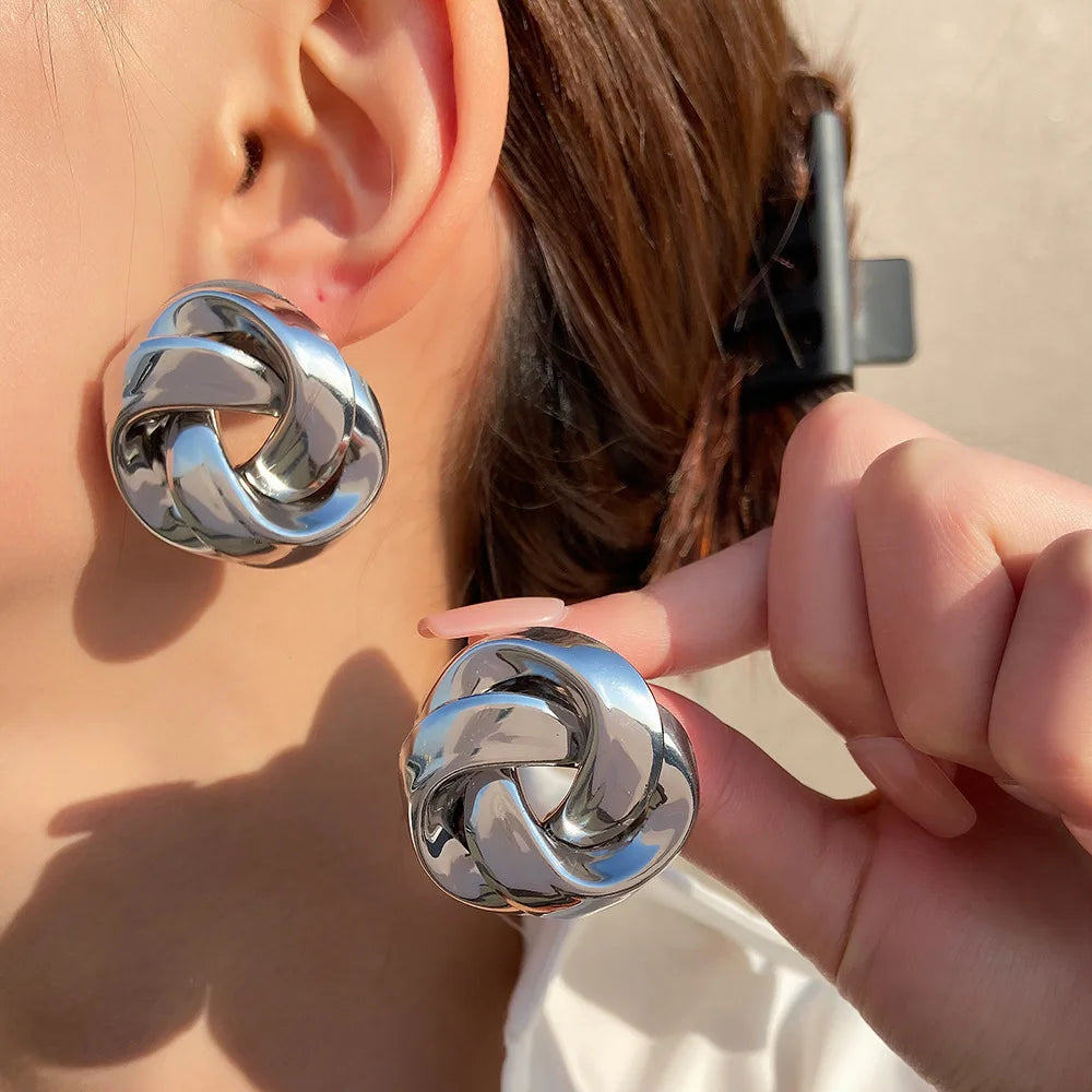 Orecchini a spirale irregolare con nodo per donna