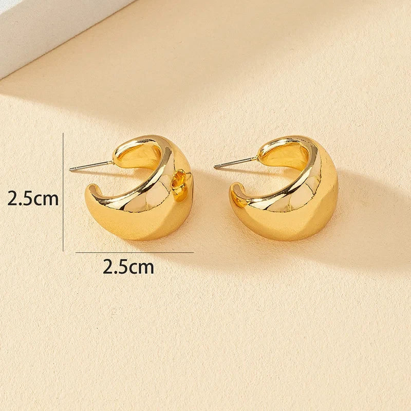 Runde, klobige Ohrringe aus Gold für Damen