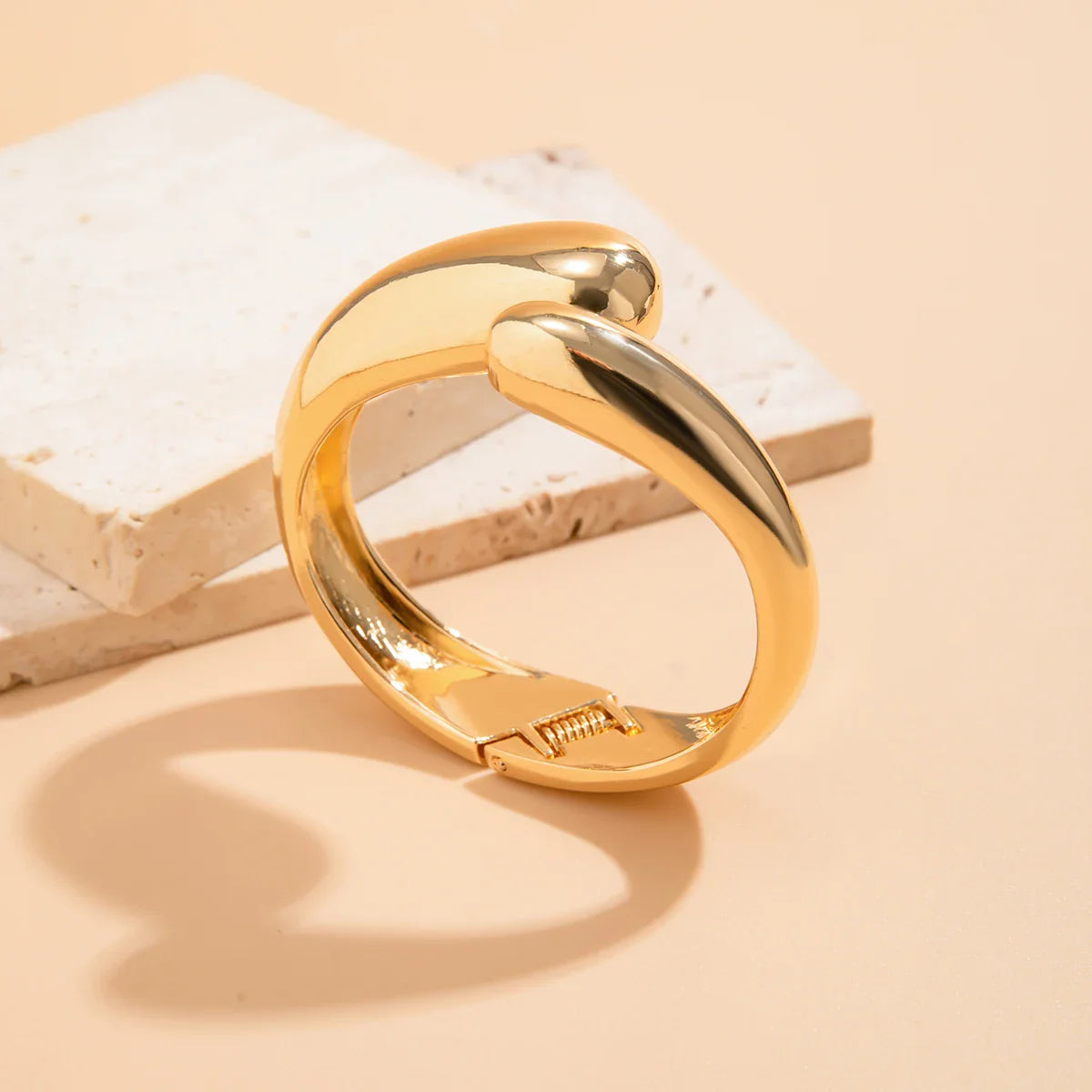 Bracciale regolabile con goccia d'acqua, stile fashion, colore oro e argento