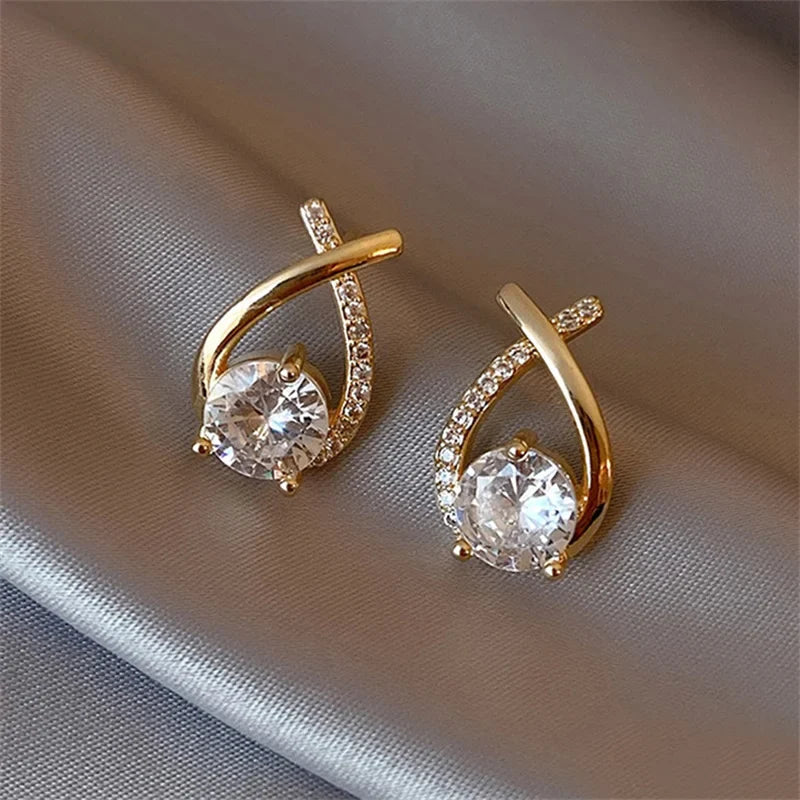 Orecchini a forma di croce con elegante cristallo per donna