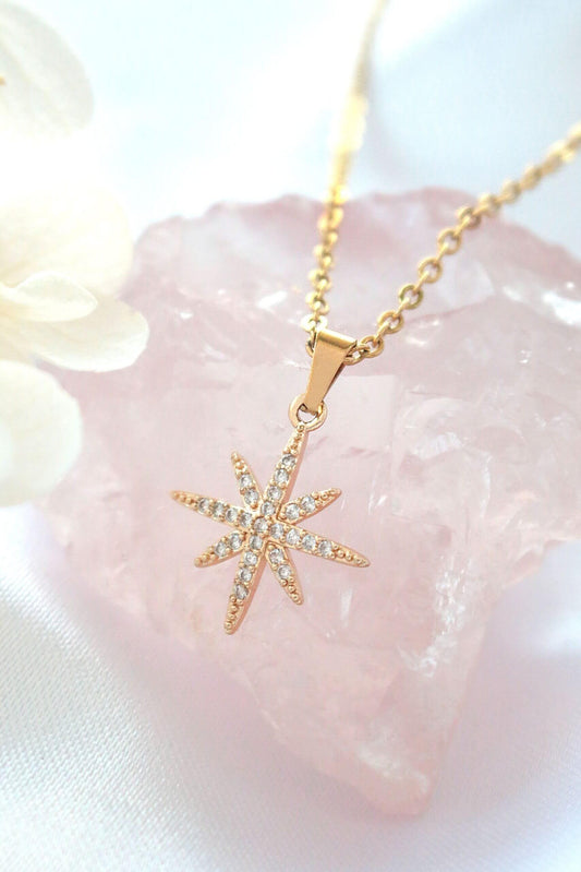 Collana con stella Polaris da 24 carati