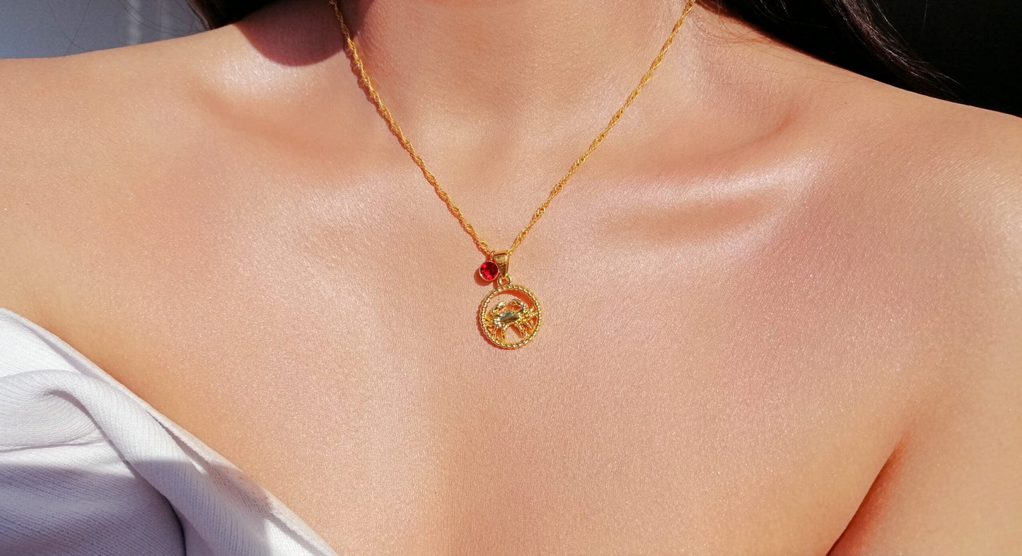 Collana con segno zodiacale e pietra portafortuna in oro 18 carati