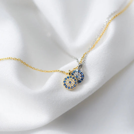 Collana classica alla moda in argento sterling 925 color oro con pendenti con occhi di cristallo blu per donna