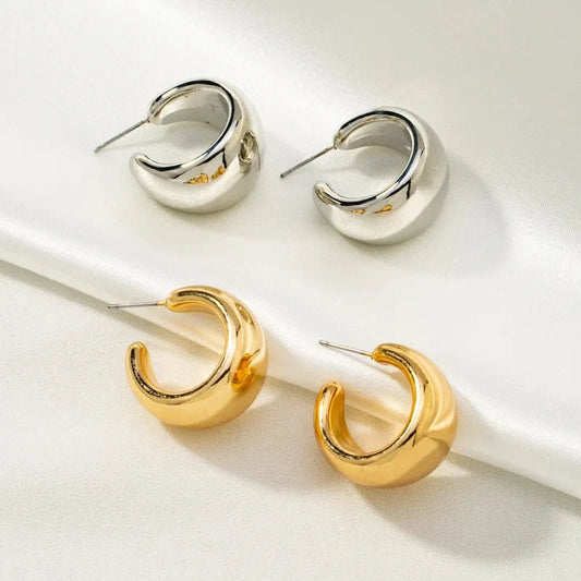 Runde, klobige Ohrringe aus Gold für Damen